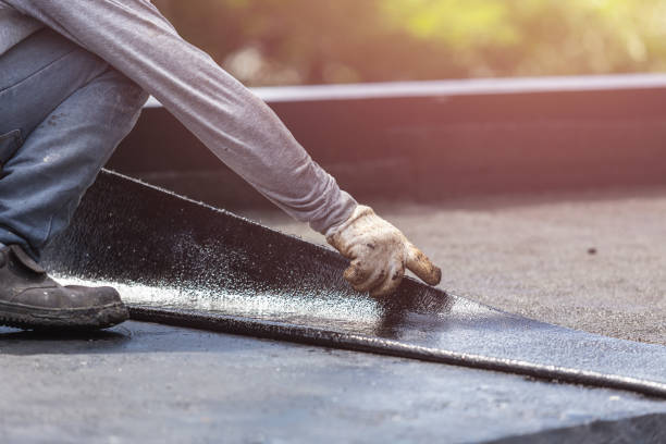Professional Basement Waterproofing technician working in Naperville, IL